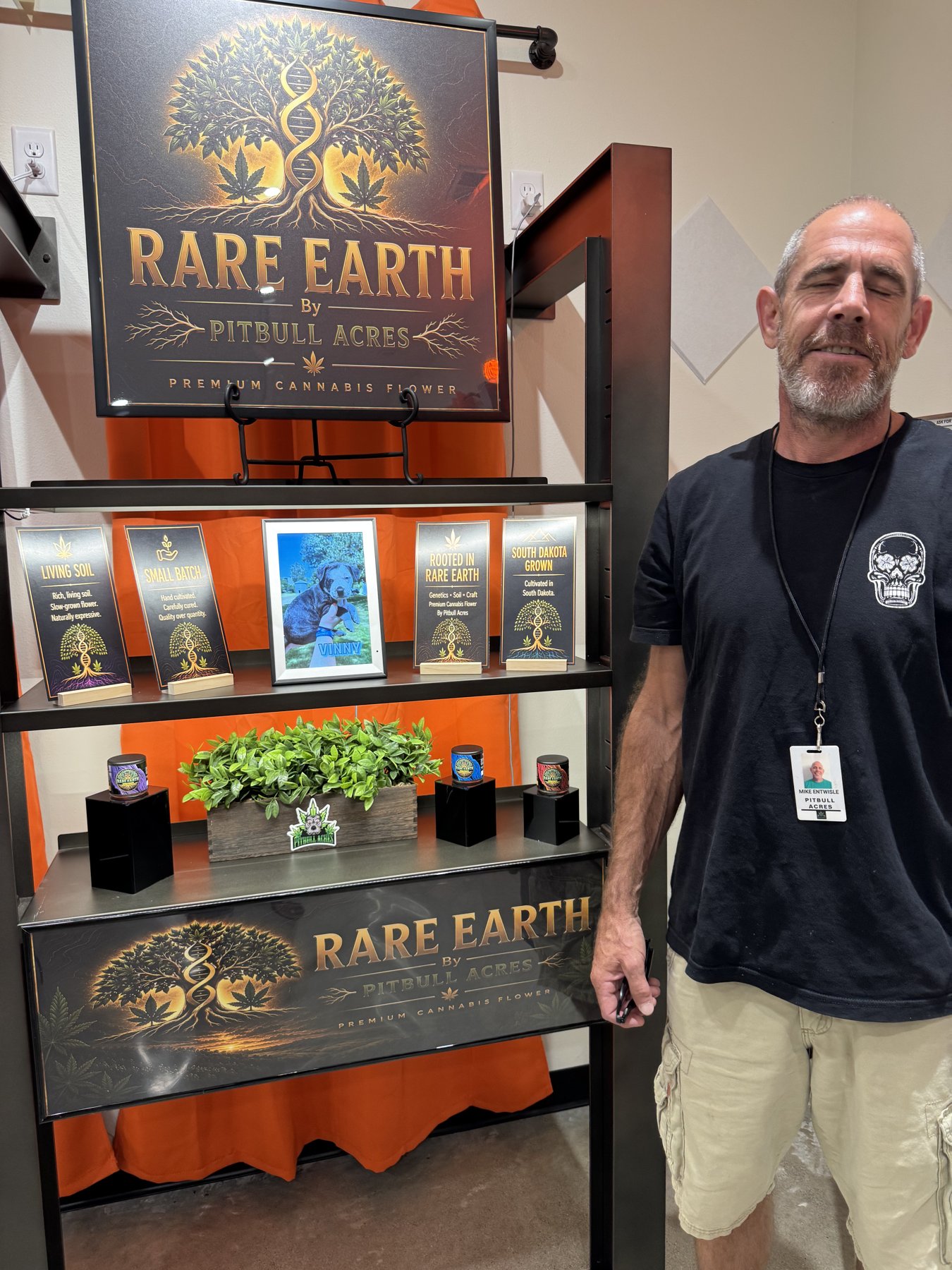 Rare Earth by Pitbull Acres branded retail display and shelf talkers in a dispensary — Source IE case study.